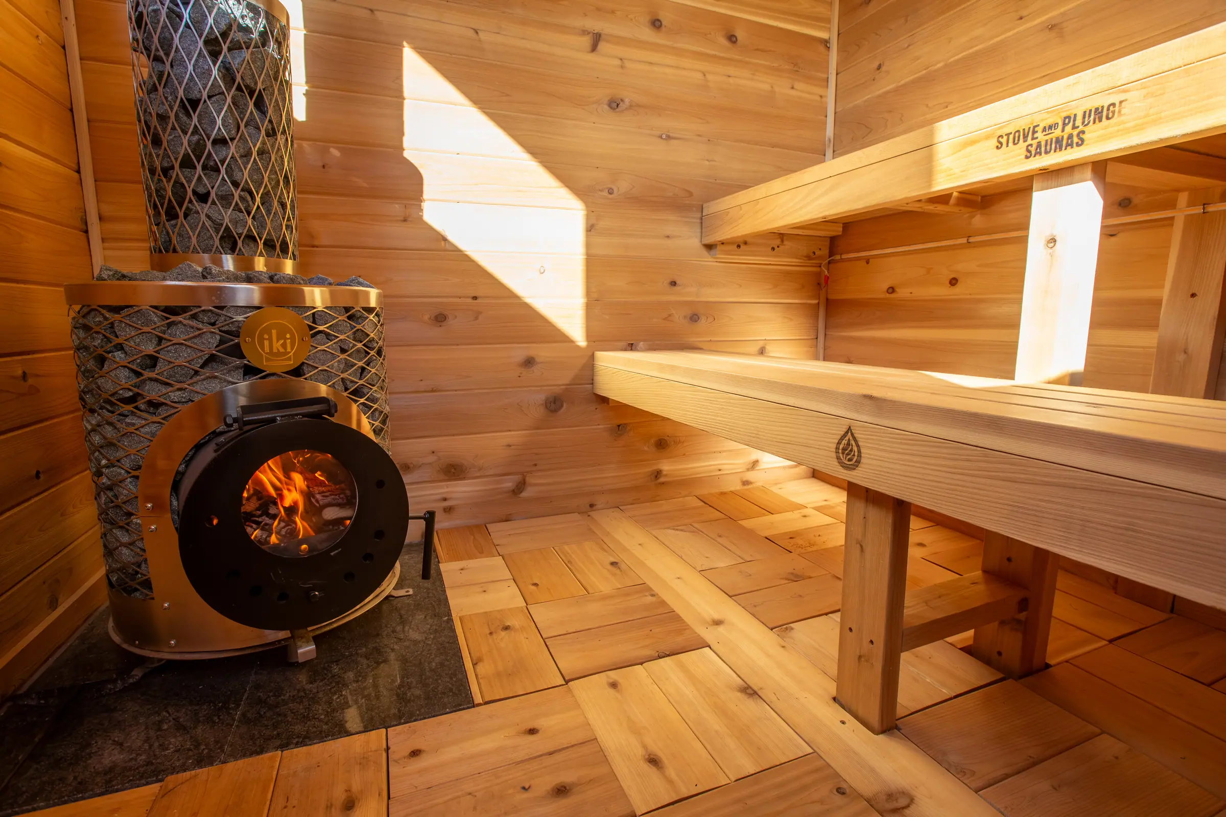 Close view of cedar sauna bench boards and supports