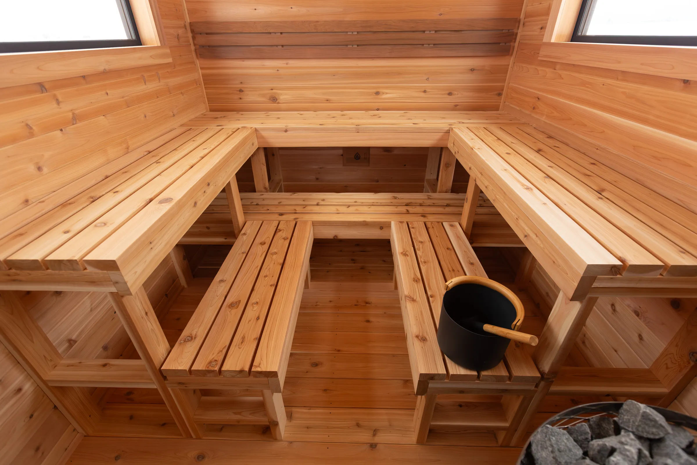 Two-level cedar benches wrapping three walls
