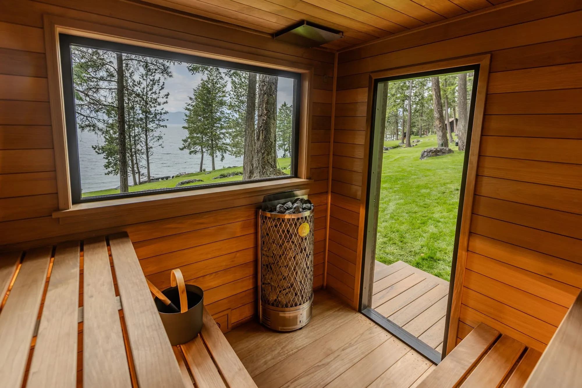 Cedar interior with a picture window over a lake